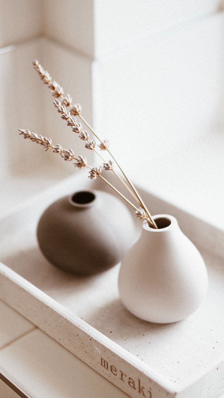 white and brown vases